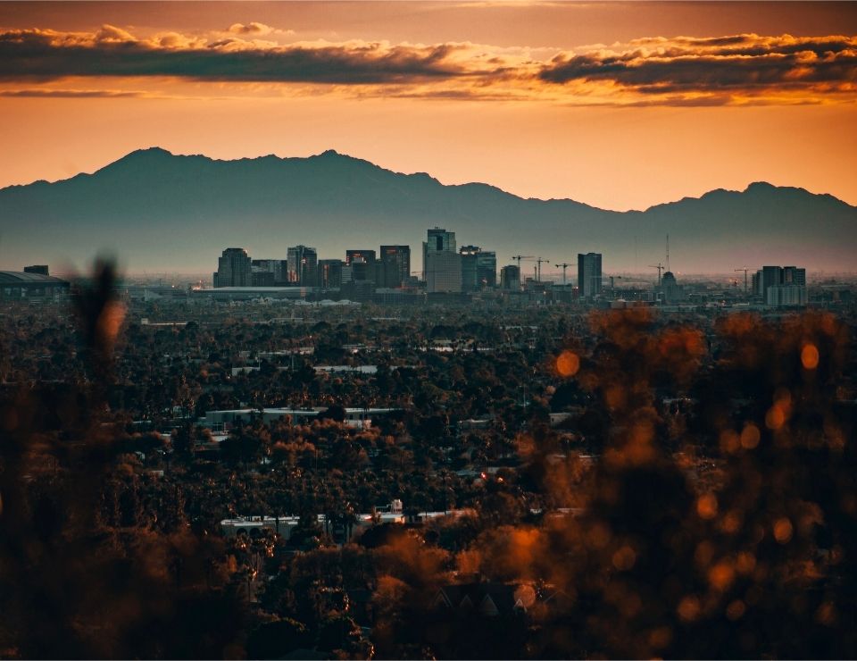 sunset view of downtown Phoenix, Pros & Cons of Living in Phoenix