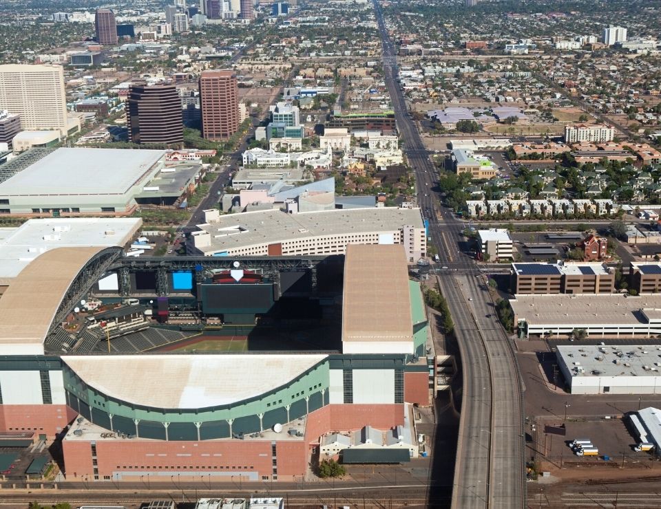 aerial of Phoeniz AZ's sports stadium, Living in Arizona vs Living in Colorado