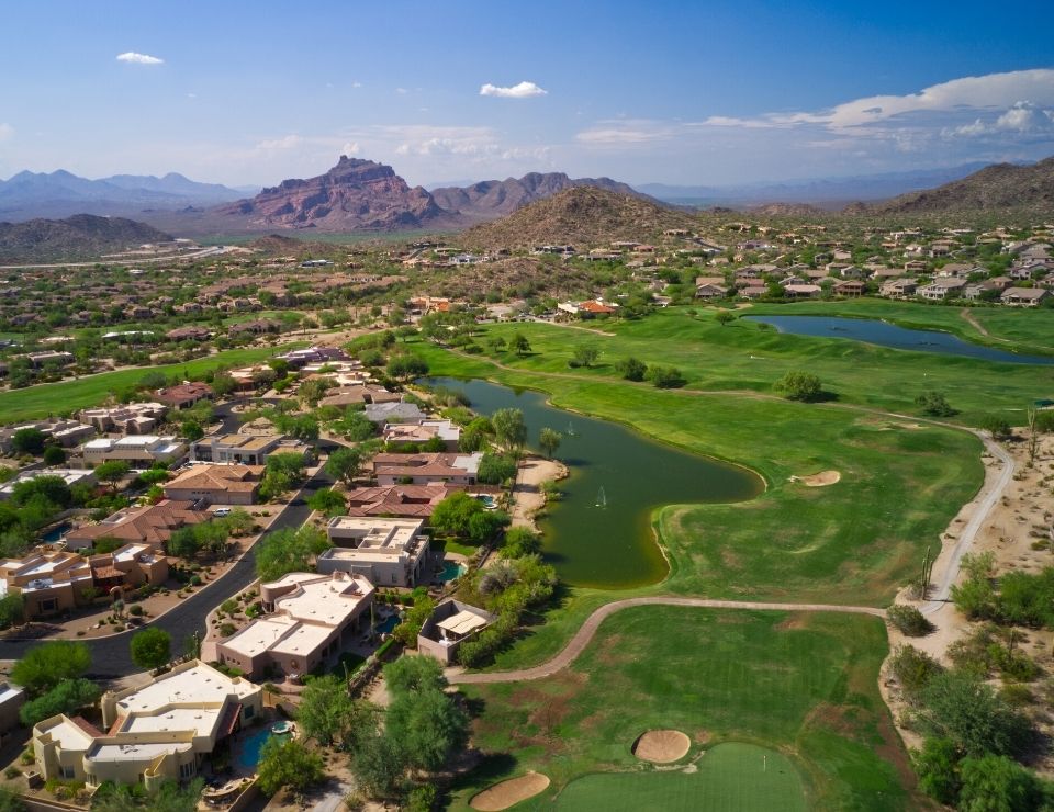 aerial view of a Phoenix neighborhood and golf course, East vs West Valley Phoenix (2)
