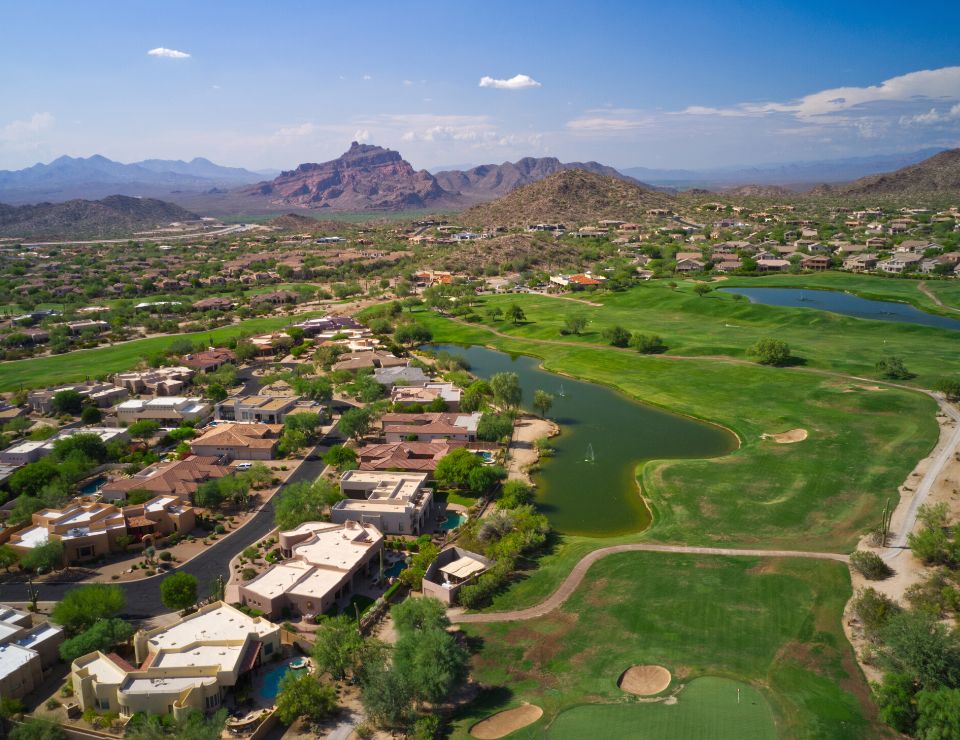 aerial view of a PHX neighborhood on a golf course, New pros and cons of living in Phoenix Arizona